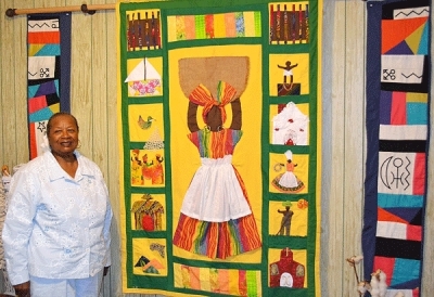 Ms. Rodrigues is a Gullah artist who creates story quilts that highlight the cultural values and history of the Gullah people.